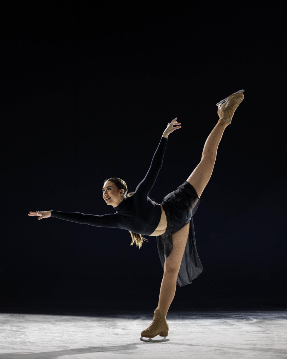 Disney on Ice skater Izzi Gorowsky performs a spiral on the ice