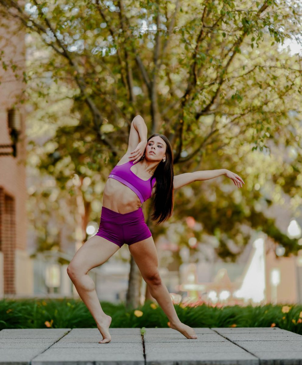 Junior Claire Monge poses in Tiger Friday dancewear