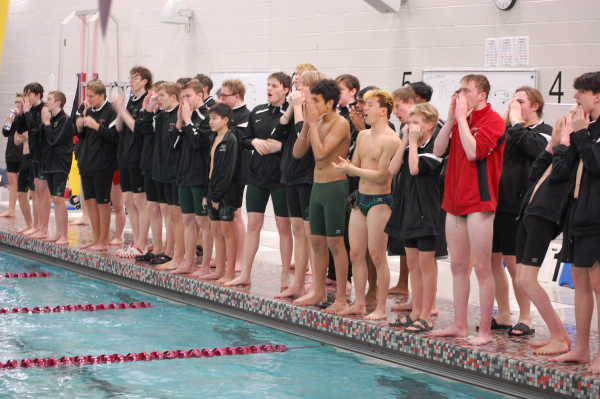 Photo VIA Joseph Cole (Mounds View Boys Swim and Dive team cheering at the Stillwater meet held at Edgewood Middle School)